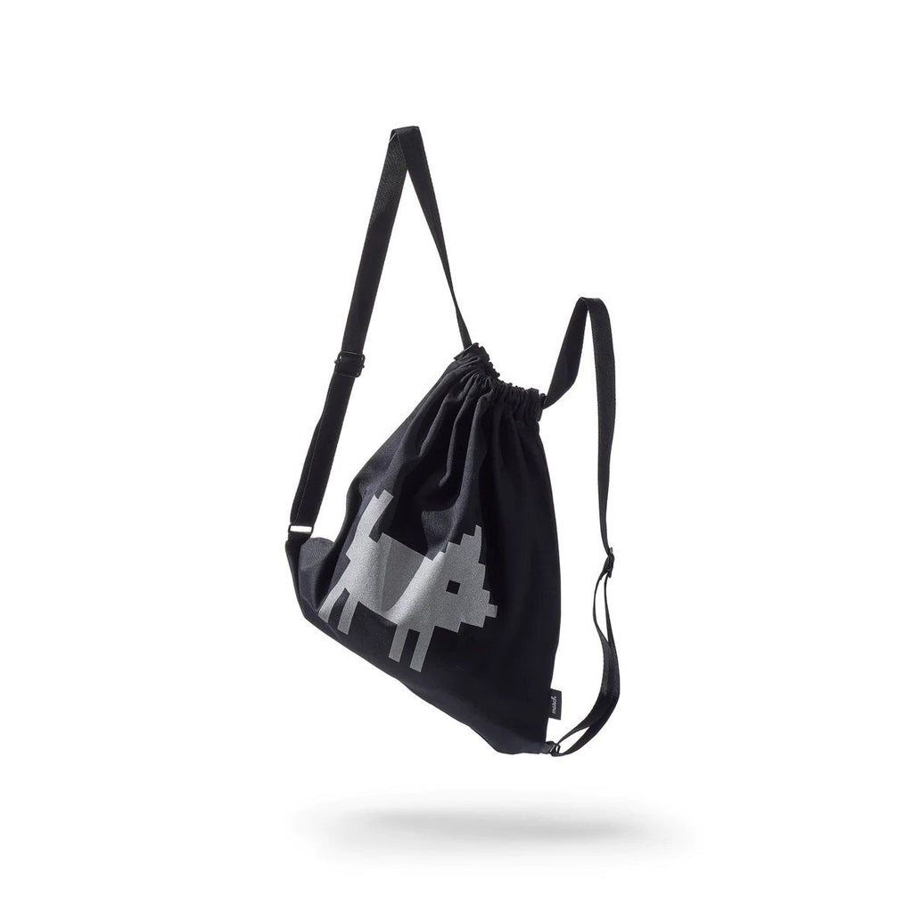 7. Studio shot of March Design Studio's Water Resistant Reflective Backpack DOG, showing reflective print and strap details