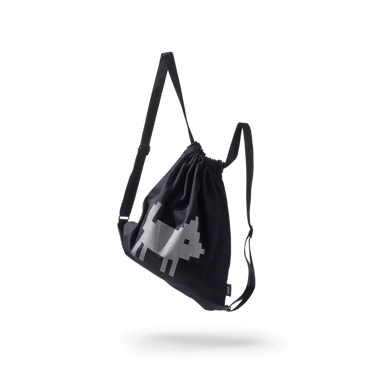 7. Studio shot of March Design Studio's Water Resistant Reflective Backpack DOG, showing reflective print and strap details