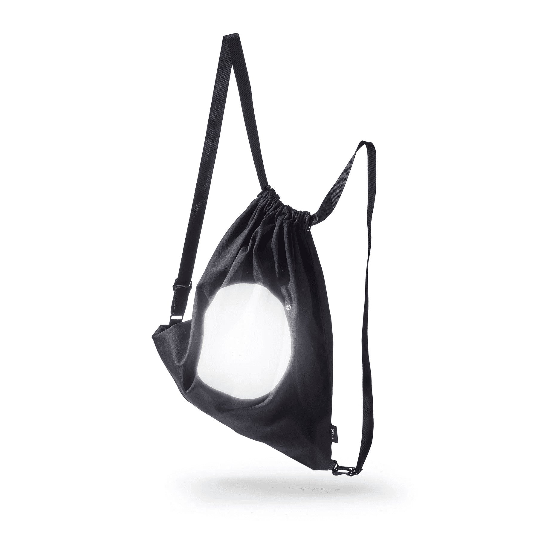 3. Studio shot of March Design Studio's Water Resistant Reflective Backpack DOT, featuring reflective circle and adjustable strap