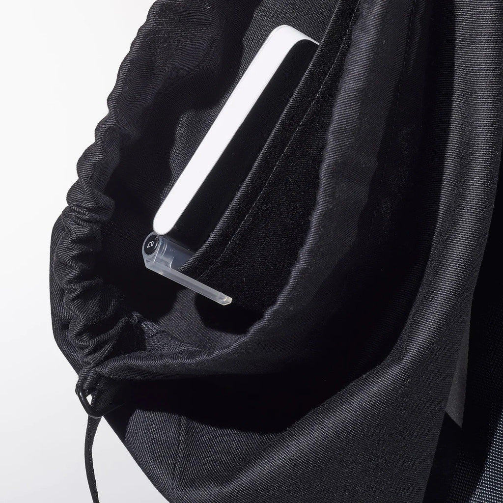 6. Close-up of inside pocket in March Design Studio's Water Resistant Reflective Backpack DOG, highlighting organization feature