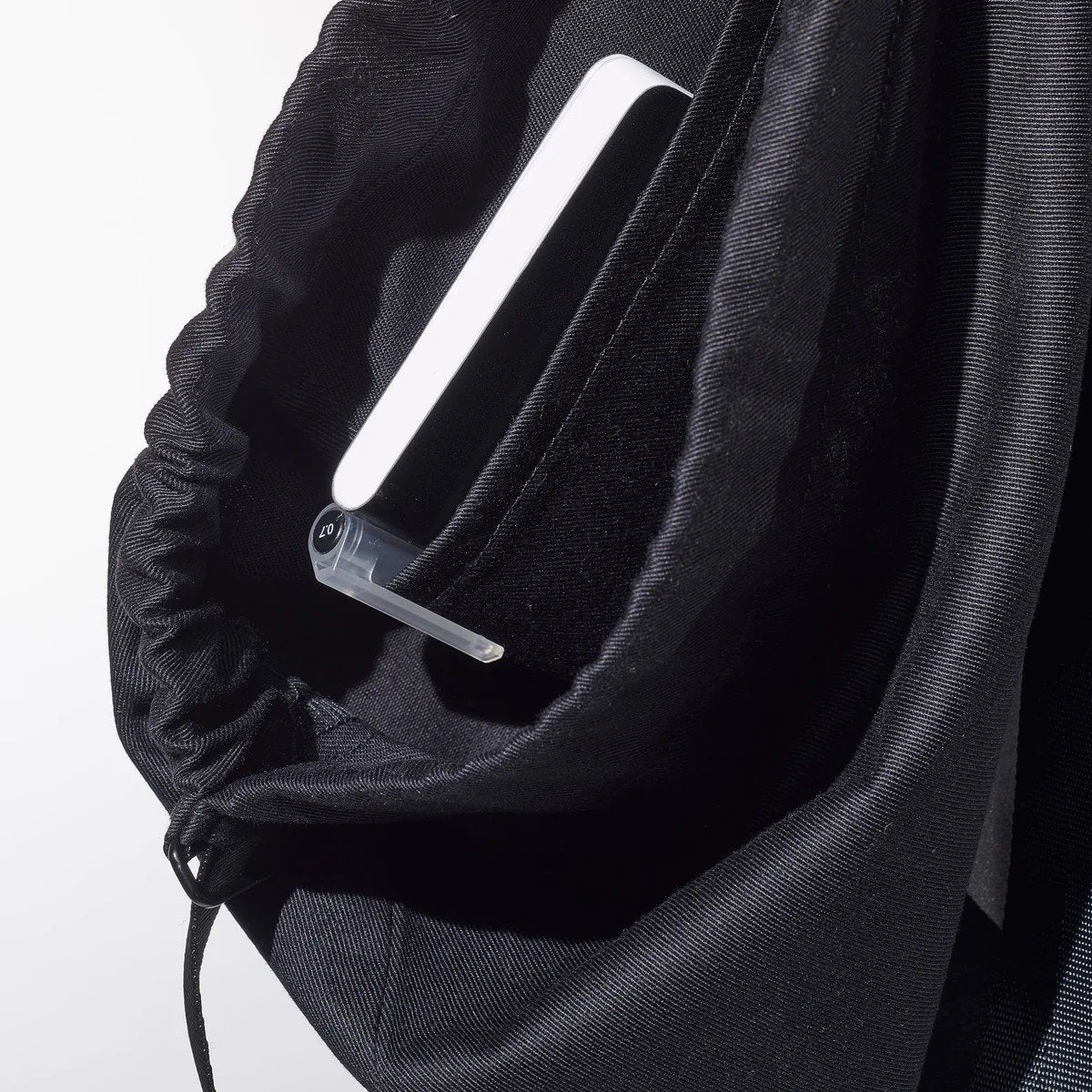 6. Close-up of inside pocket in March Design Studio's Water Resistant Reflective Backpack DOG, highlighting organization feature