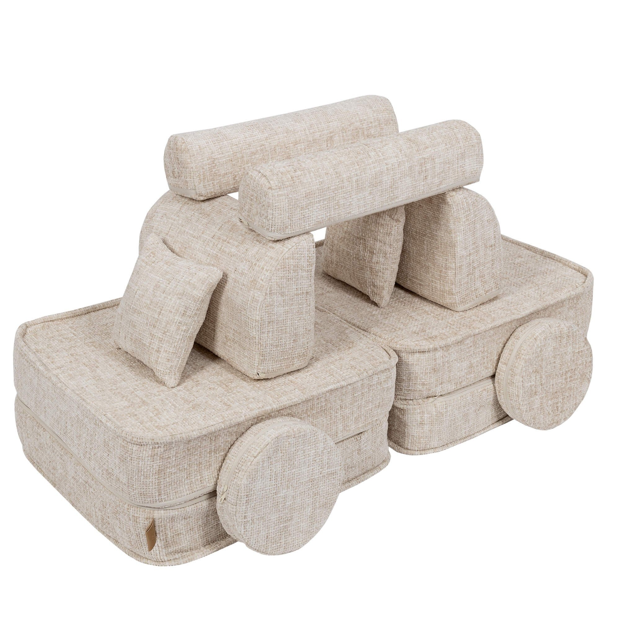 3. Beige modular children's sofa arranged as a creative structure, shown in a studio setting