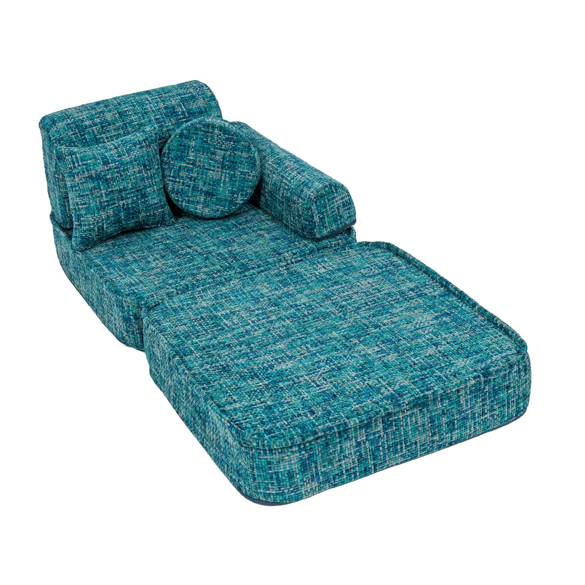 2. Medium modular sofa for kids in tangle lagoon blue arranged creatively with cushions, shown in a studio
