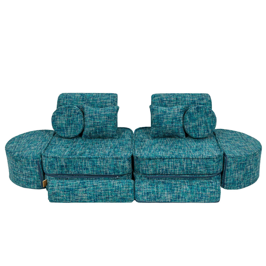 5. Lagoon blue modular sofa with cushions and ottomans in a balanced configuration