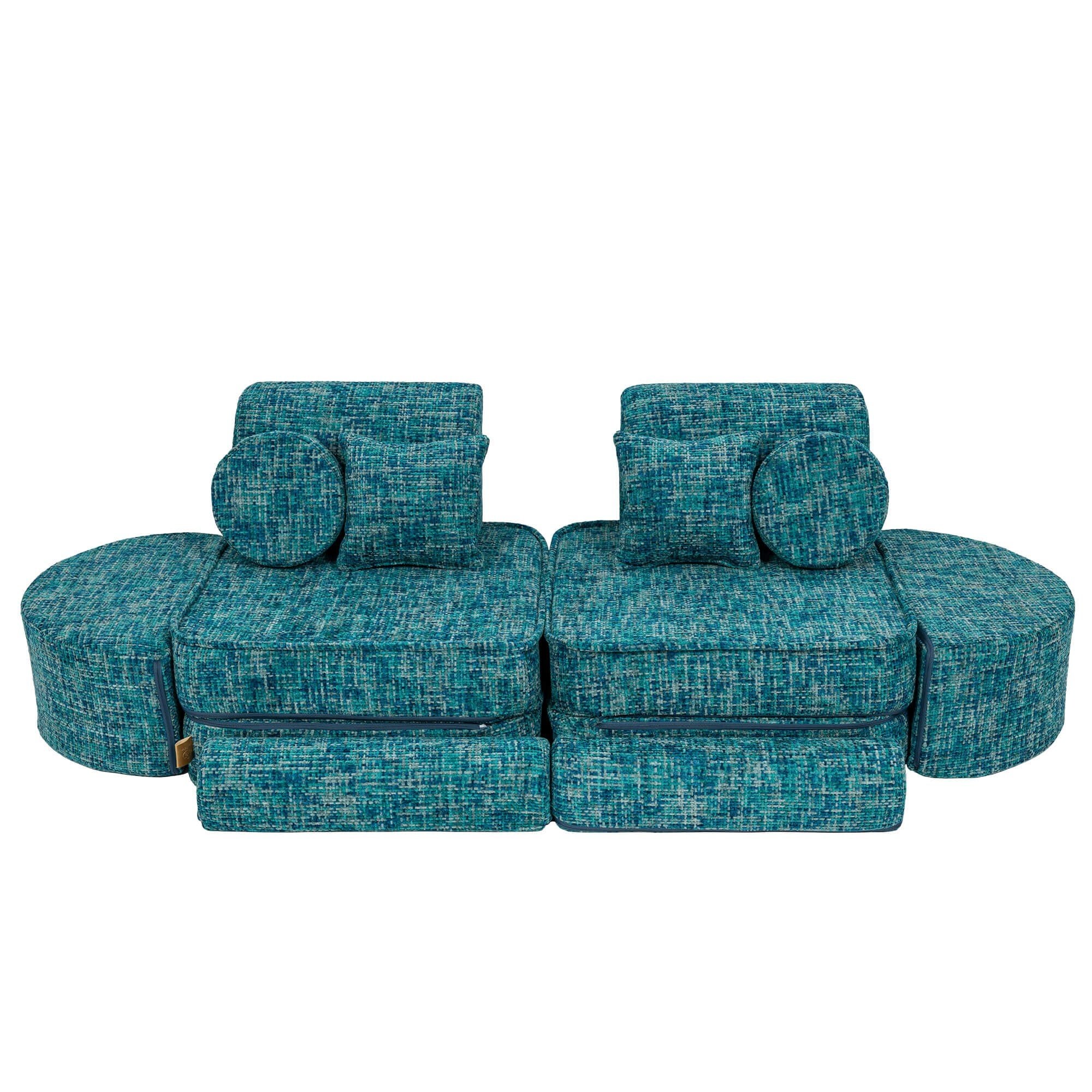 5. Lagoon blue modular sofa with cushions and ottomans in a balanced configuration
