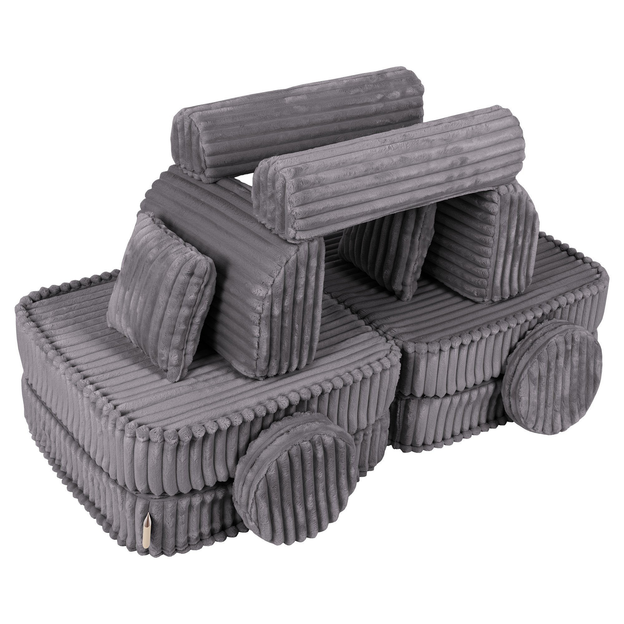 3. Medium modular kids sofa in Jurassic grey, creatively arranged in a playful structure with ribbed corduroy texture.