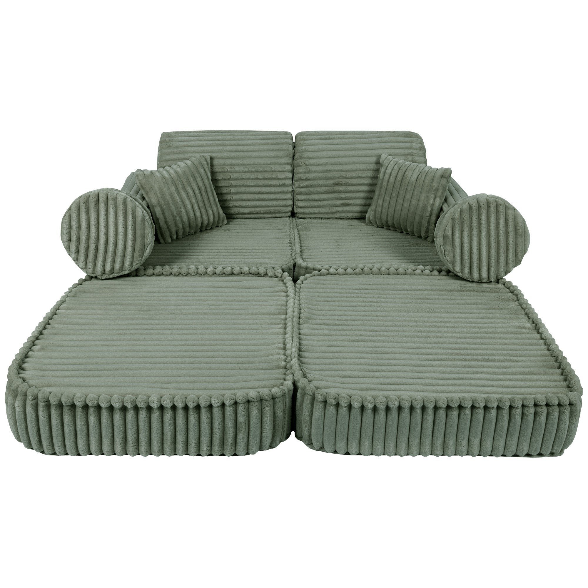 8. Medium kids sofa in sage green ribbed corduroy, fully extended to show spacious lounging area with round cushions