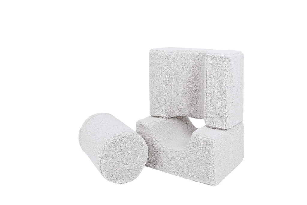 4. MeowBaby Bearly Shape Set with three white elements stacked and one cylindrical piece, showing construction possibilities