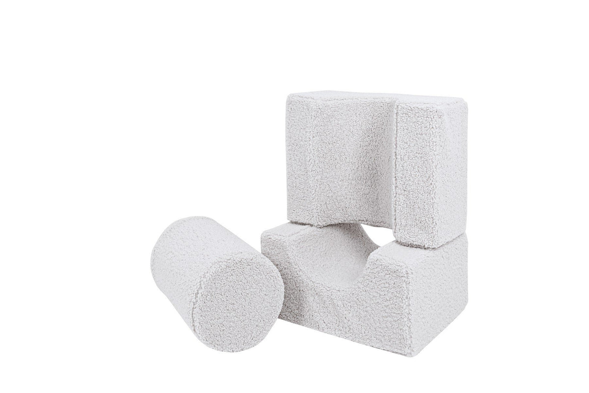 4. MeowBaby Bearly Shape Set with three white elements stacked and one cylindrical piece, showing construction possibilities
