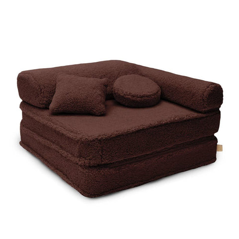 1. Modular children's chair in dark brown with double mattress, headrest, armrest, and two cushions on a white background