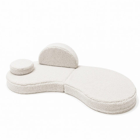 2. Single piece of modular kids' sofa in Bearly off-white with circular cushion and backrest on a white background