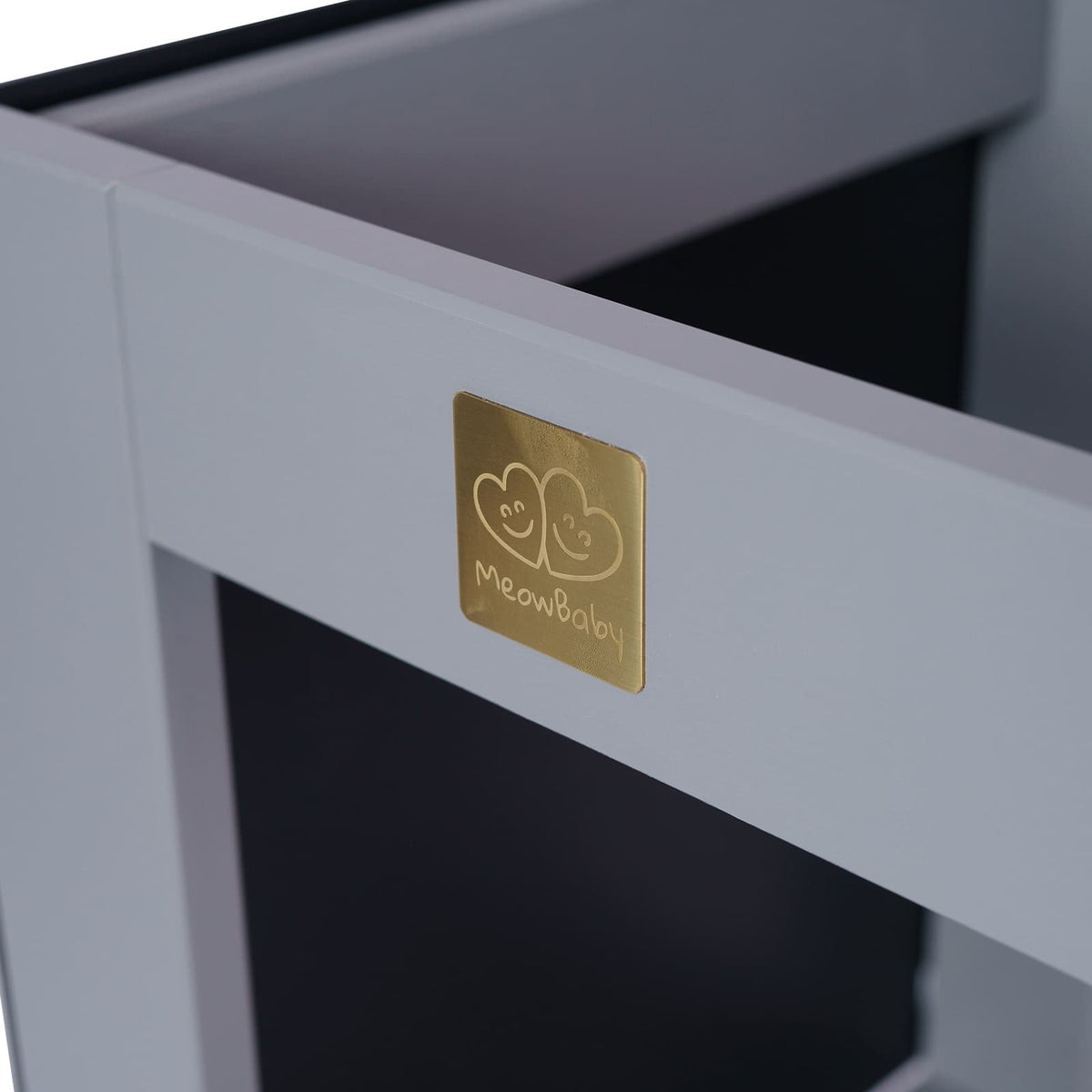 3. Close-up of MeowBaby logo on dark grey kitchen helper