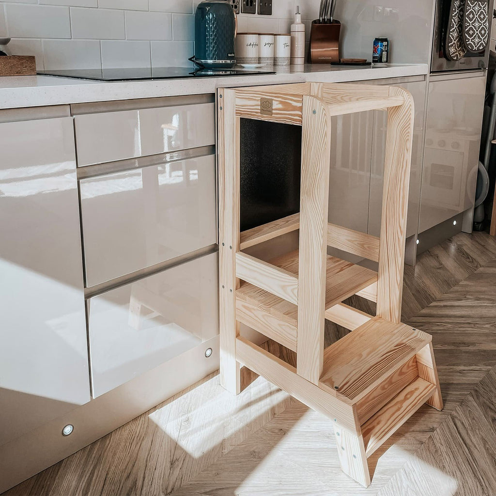 3. Side view of wooden kitchen helper in natural finish against kitchen cabinets