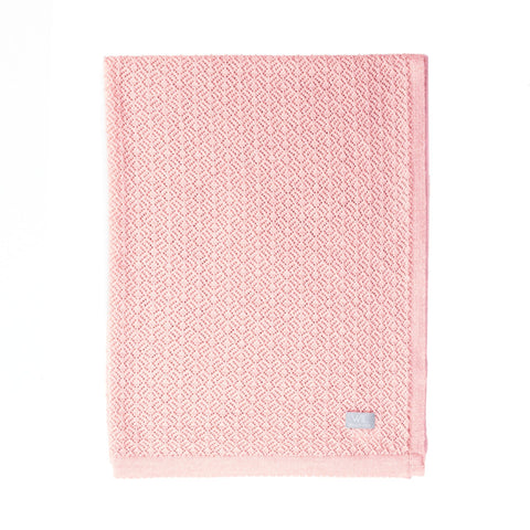 2. Pink merino wool baby blanket with Wool In Love label on white background