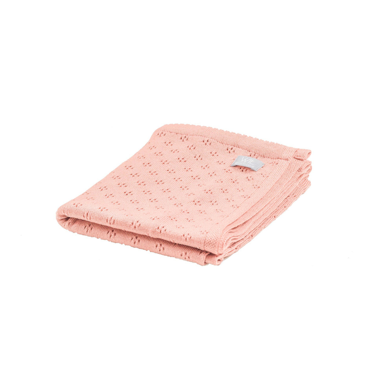 2. Folded pink merino wool baby blanket with floral pattern on white background