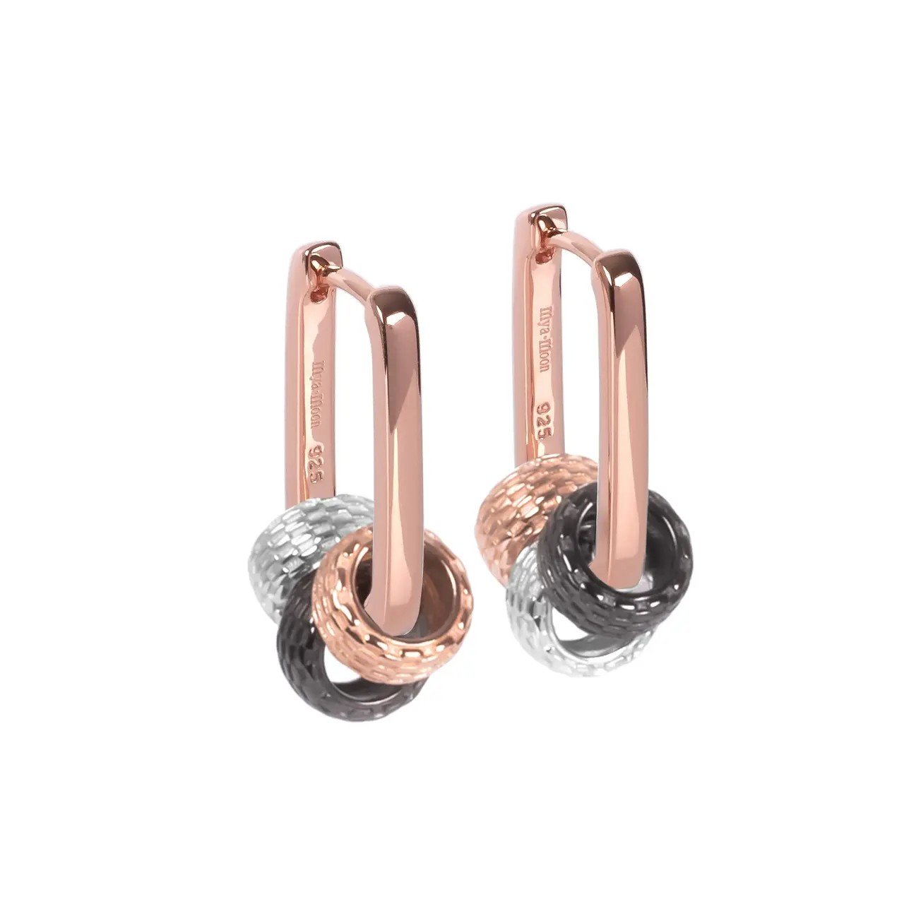 1. MyaMoon Metropolitan Hoops Rolling Charm in rose gold and silver, featuring versatile design with additional charms, shown in studio setting