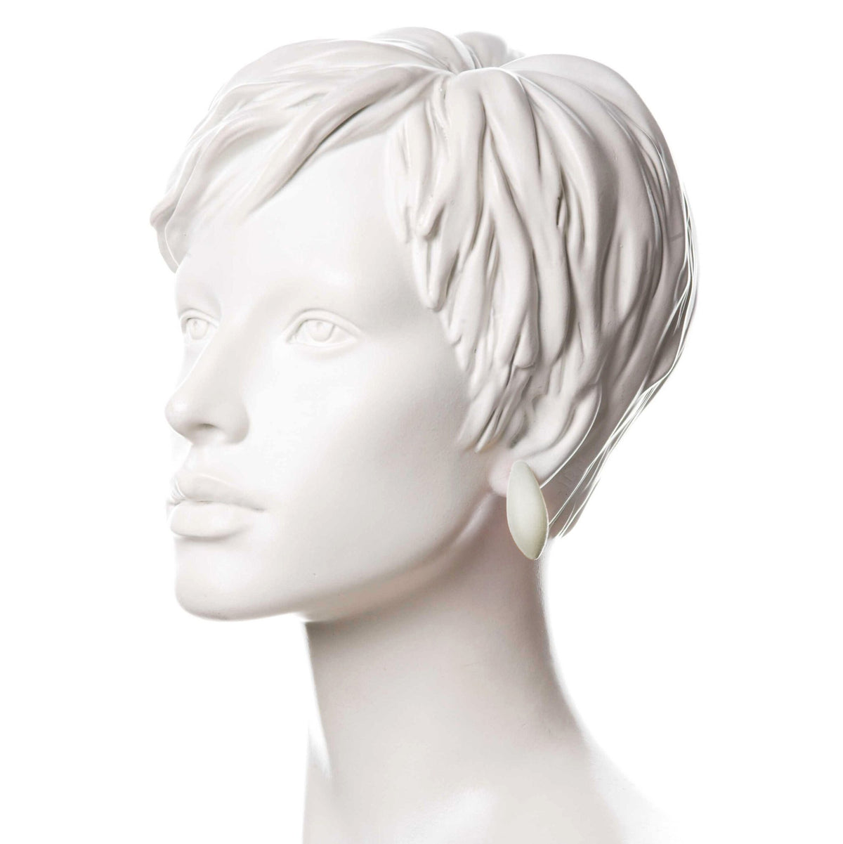 1. White mannequin head wearing Tanel Veenre Mini Snowberries Earring in white, showcasing elegant design and length