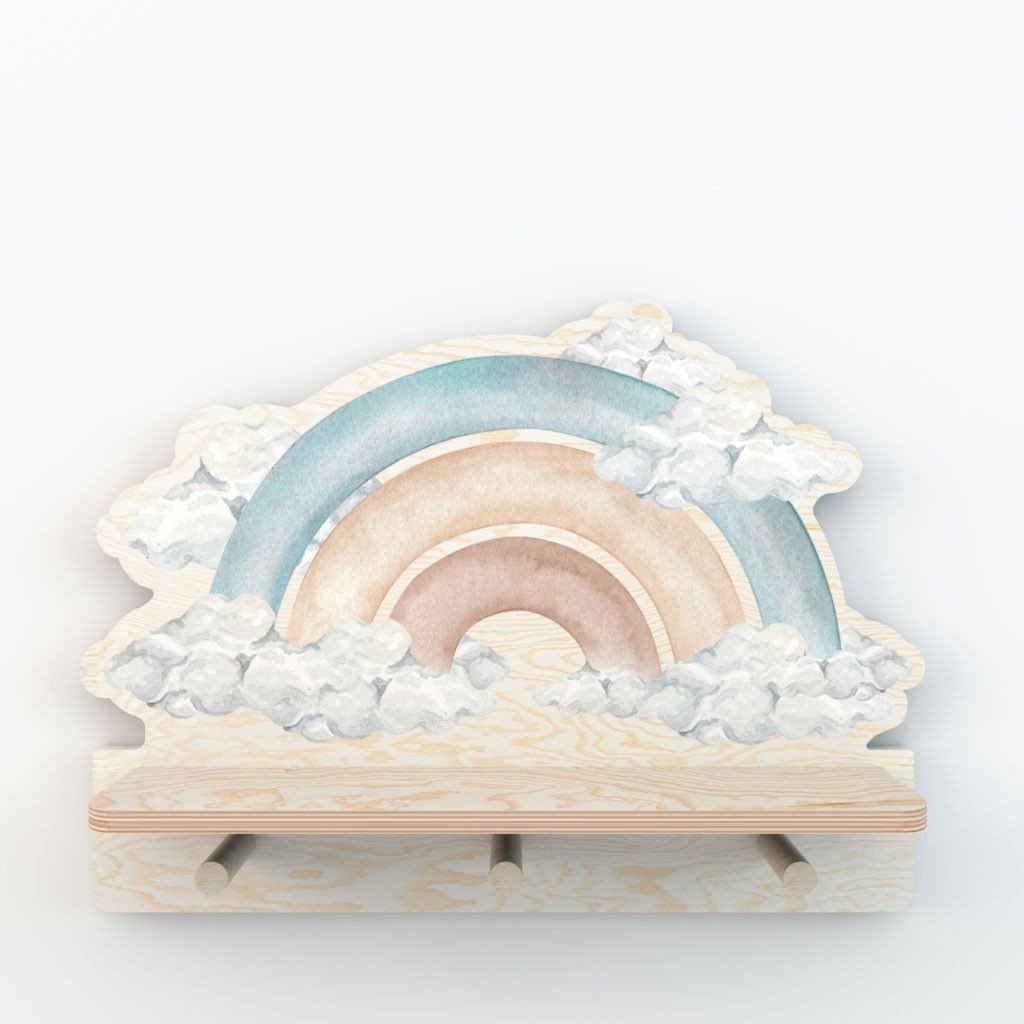7. Studio shot of mini wall shelf with blue rainbow design and three pegs on a white background