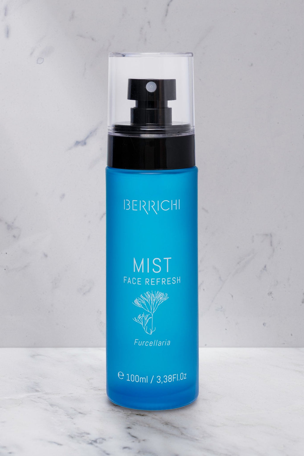 6. Berrichi MIST Face Spray bottle on marble surface, showcasing sleek design