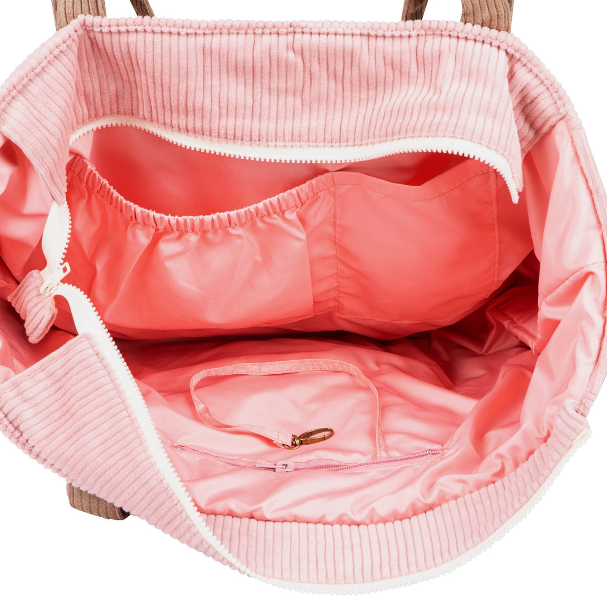 9. Interior view of pink and coffee-colored weekender bag showing waterproof lining and pockets