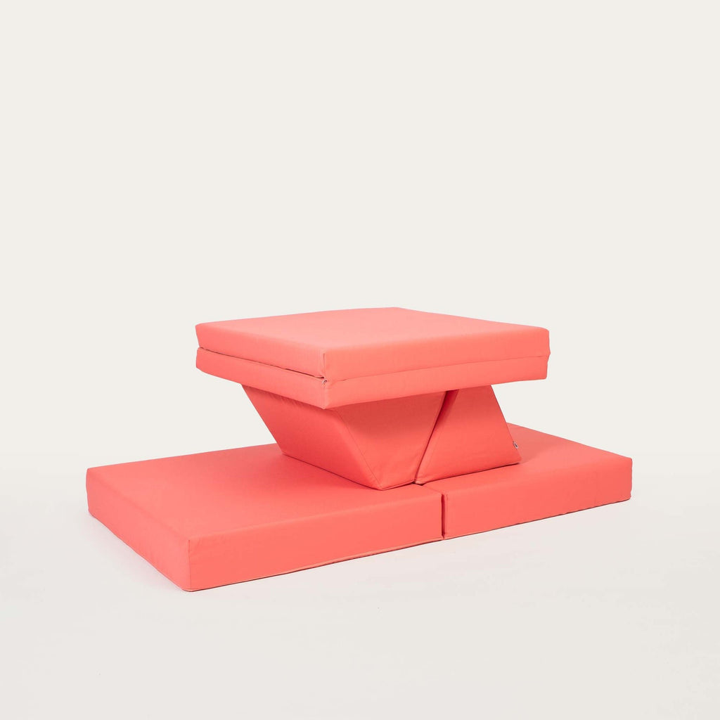 6. Coral activity play mattress set arranged in a geometric shape on a white background