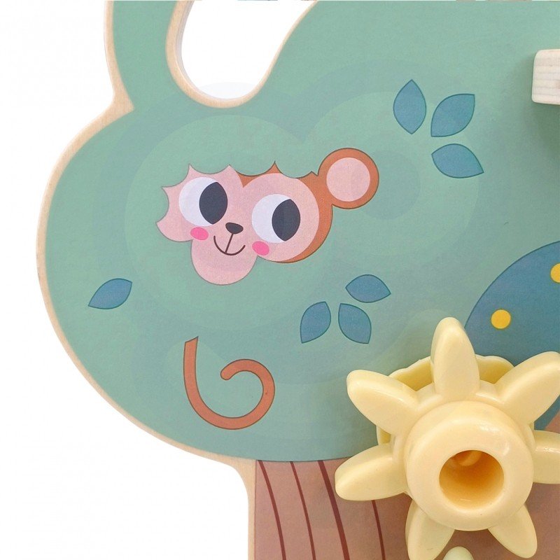 14. Close-up of a monkey illustration on the Woopie Montessori 4-in-1 activity tree, part of the decorative design.