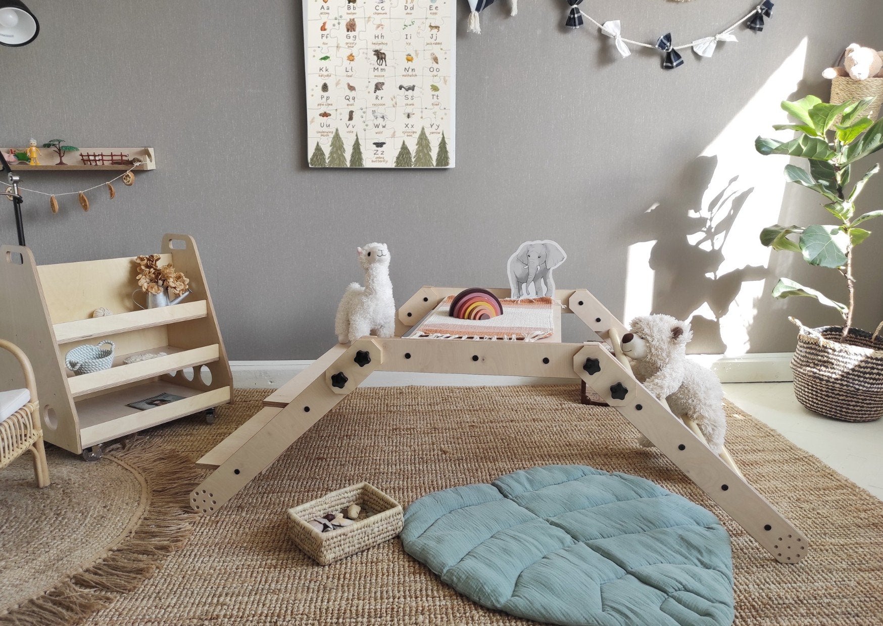 13. Montessori climbing set in a folded position with a whiteboard back, isolated on a white background.