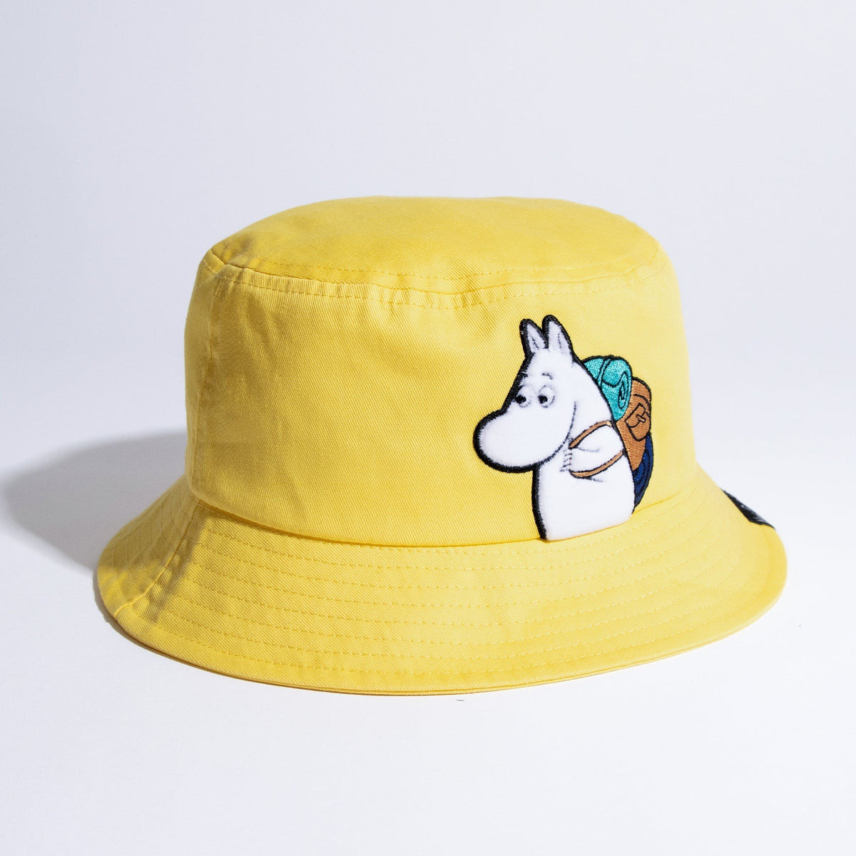 1. Moomin Adventure Kids Bucket Hat in vibrant yellow, featuring Moomin character embroidery, studio shot