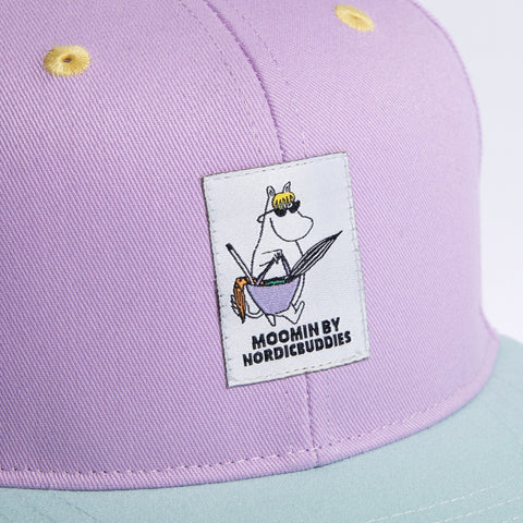 3. Close-up of Moomin Snorkmaiden kids flat cap highlighting embroidered Moomin by NordicBuddies logo