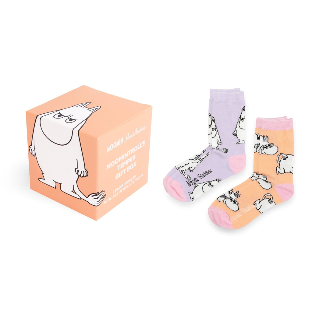 1. Moomin by NordicBuddies gift box with two pairs of socks, one lavender and one peach, featuring Moomintroll character on white background