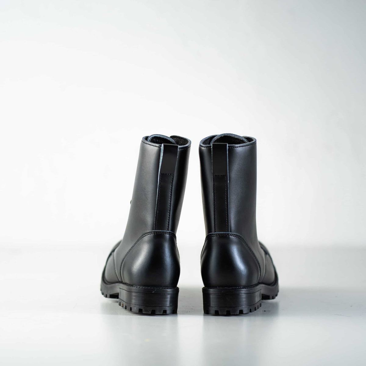 3. Back view of Samelin 511 Black boots showing sturdy construction and heel detail