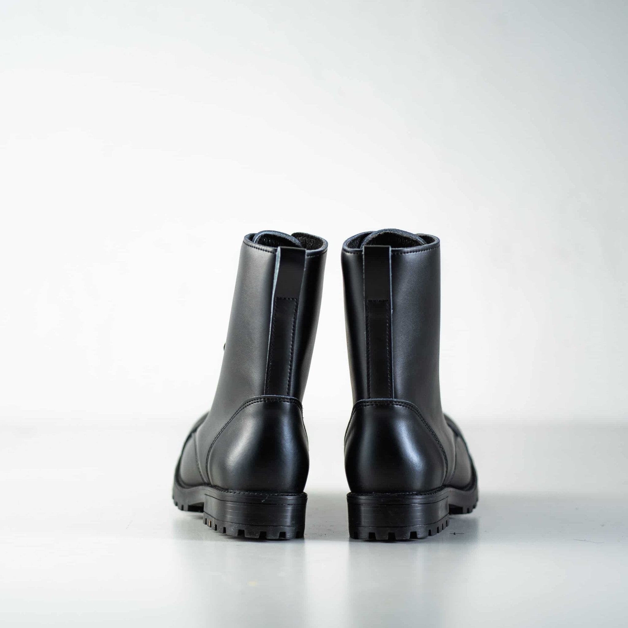3. Back view of Samelin 511 Black boots showing sturdy construction and heel detail