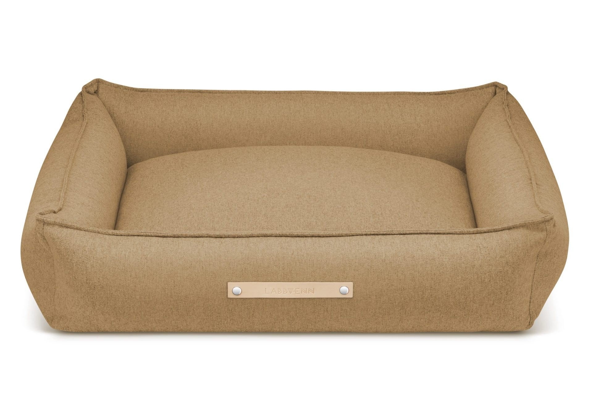 2. Labbvenn Møvik dog bed in biscuit color with leather logo tag, shown in studio setting