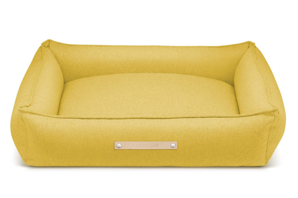 3. Labbvenn Møvik honey dog bed with leather label shown in studio lighting