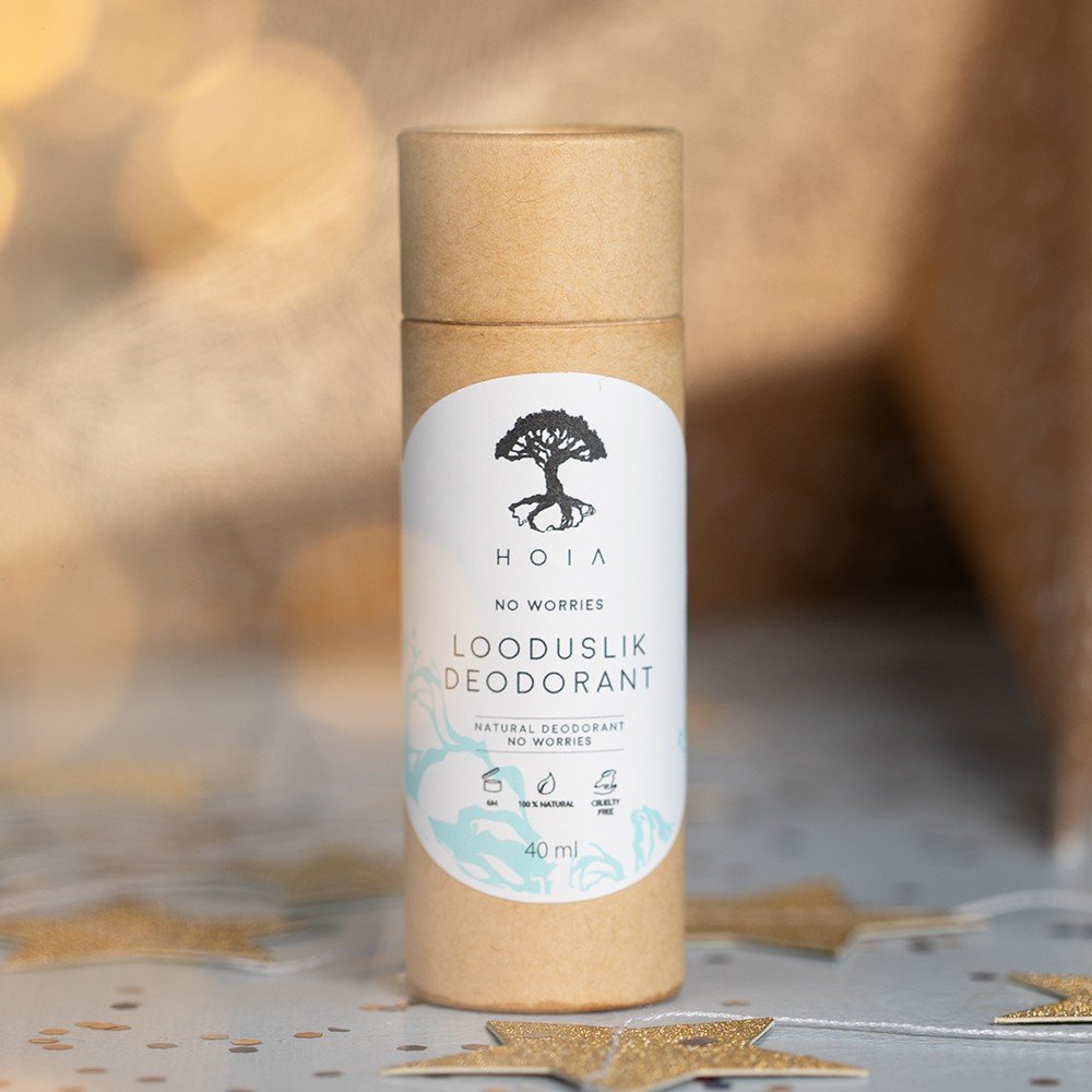 1. HOIA homespa Natural Deodorant No Worries 40ml in eco-friendly packaging with tree logo, set against a soft-focus background with golden star accents