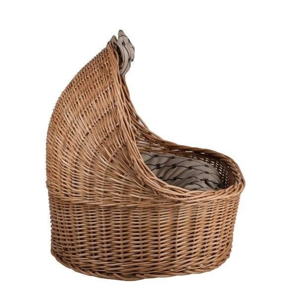 3. Side view of natural wicker pet house highlighting woven texture and cushion