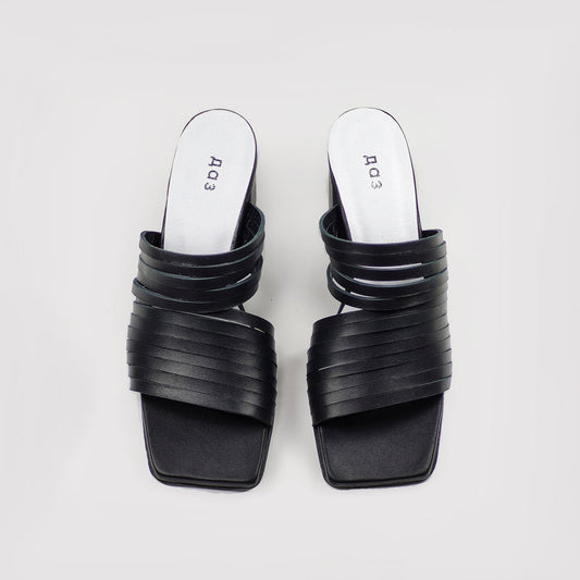 1. Women's handmade strappy matt leather sandals in black, top view showing sleek design and squared toe