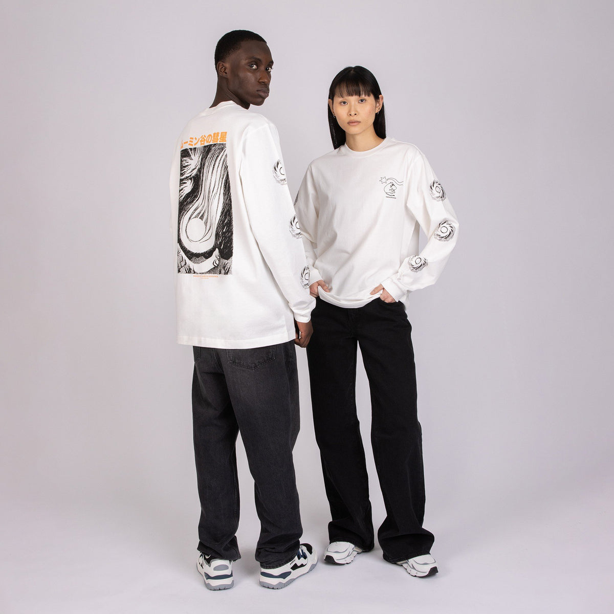 1. Unisex white Moomin longsleeve shirt worn by male and female models in studio, showcasing front and back design