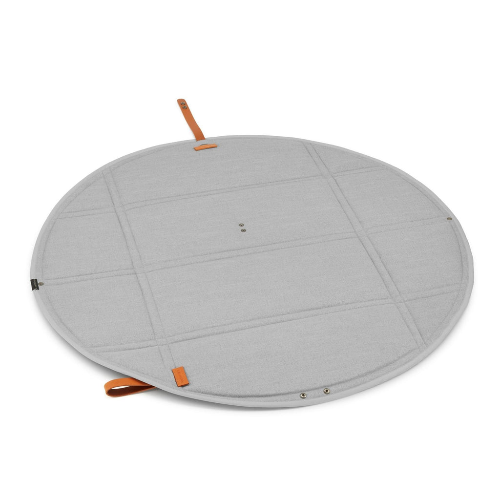 4. Fully unfolded round grey Okka travel mat with brown leather handle and strap
