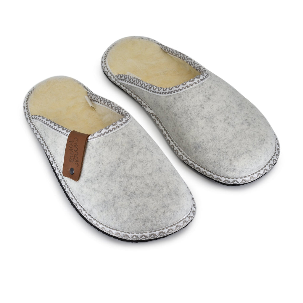 2. Pair of Omaking Halla lambswool and natural felt slippers, displayed in studio setting