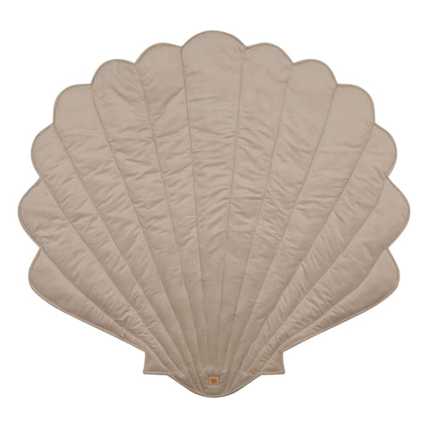 2. Studio shot of beige ginkgo leaf-shaped playmat on white background