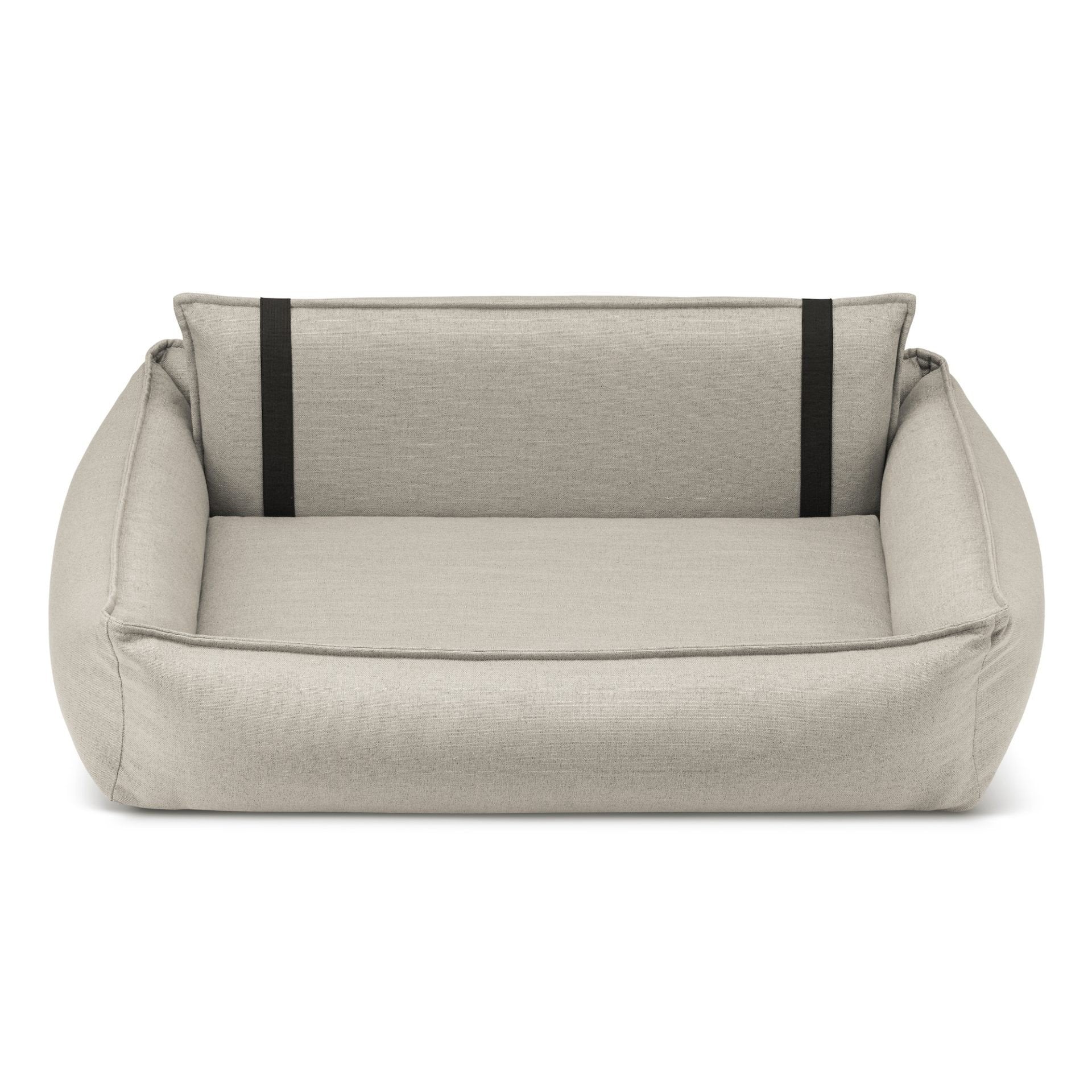 2. Beige Orteo dog bed by Labbvenn with orthopedic features, shown in studio setting highlighting removable rear backrest and elastic elements for enhanced comfort and support