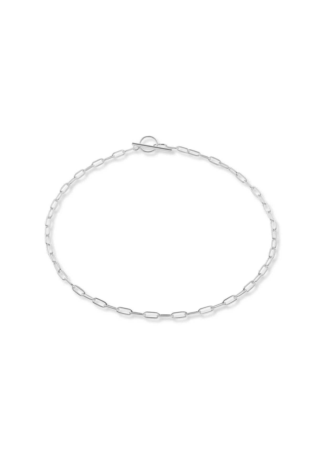 5. Flat lay of NO MORE silver paper clip choker, showcasing full chain and T-bar closure