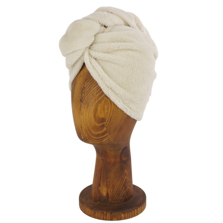 8. Cream bamboo-cotton hair turban on wooden mannequin head
