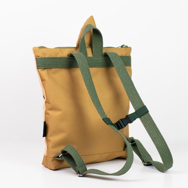 3. Back view of Muni PEAR kids backpack showing adjustable green shoulder straps