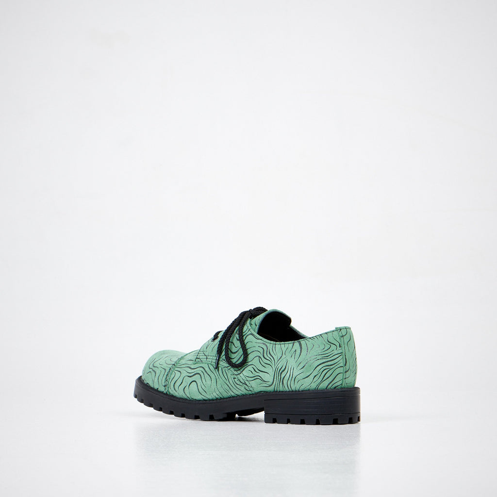 2. Unisex Samelin Green Zebra Widgets, left side angle showing leather texture