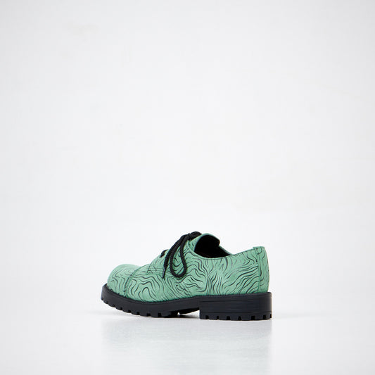 2. Unisex Samelin Green Zebra Widgets, left side angle showing leather texture