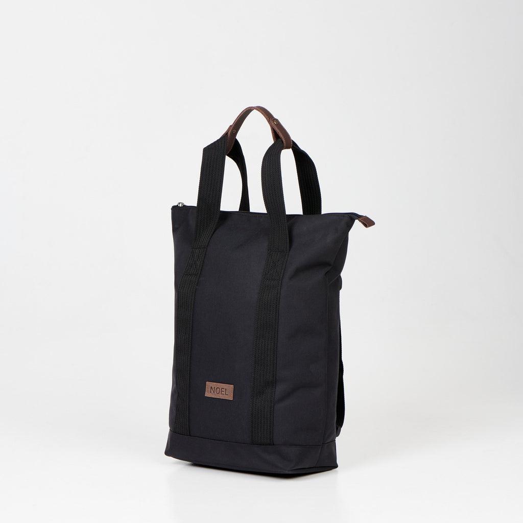 2. Black Noel 3in1 bag displayed as a shoulder bag with handles in studio