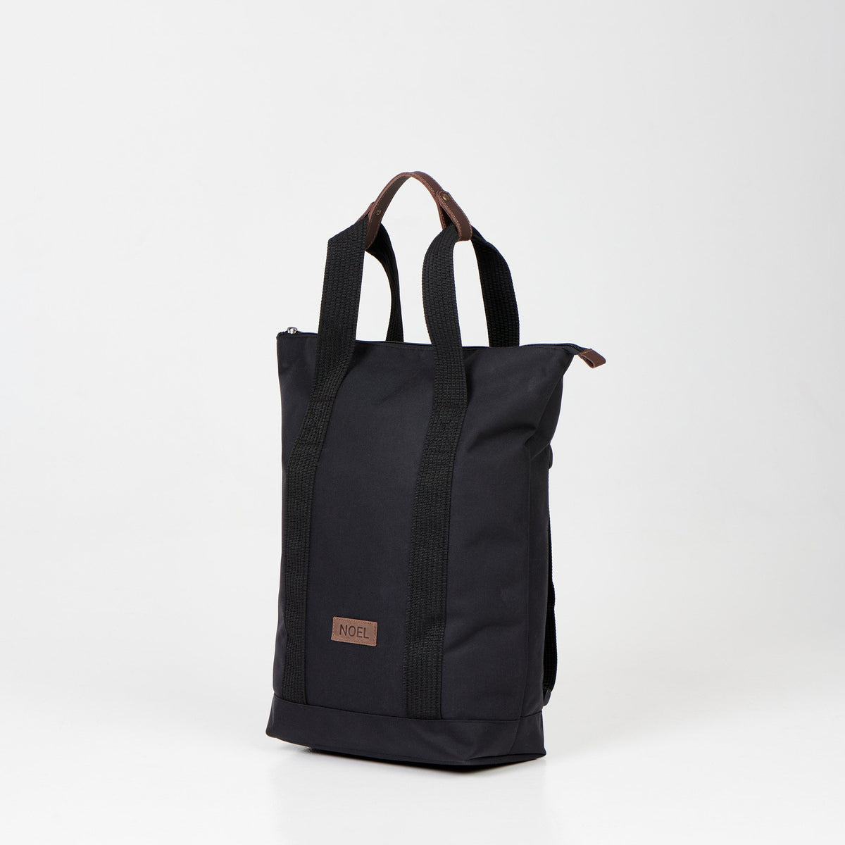 2. Black Noel 3in1 bag displayed as a shoulder bag with handles in studio