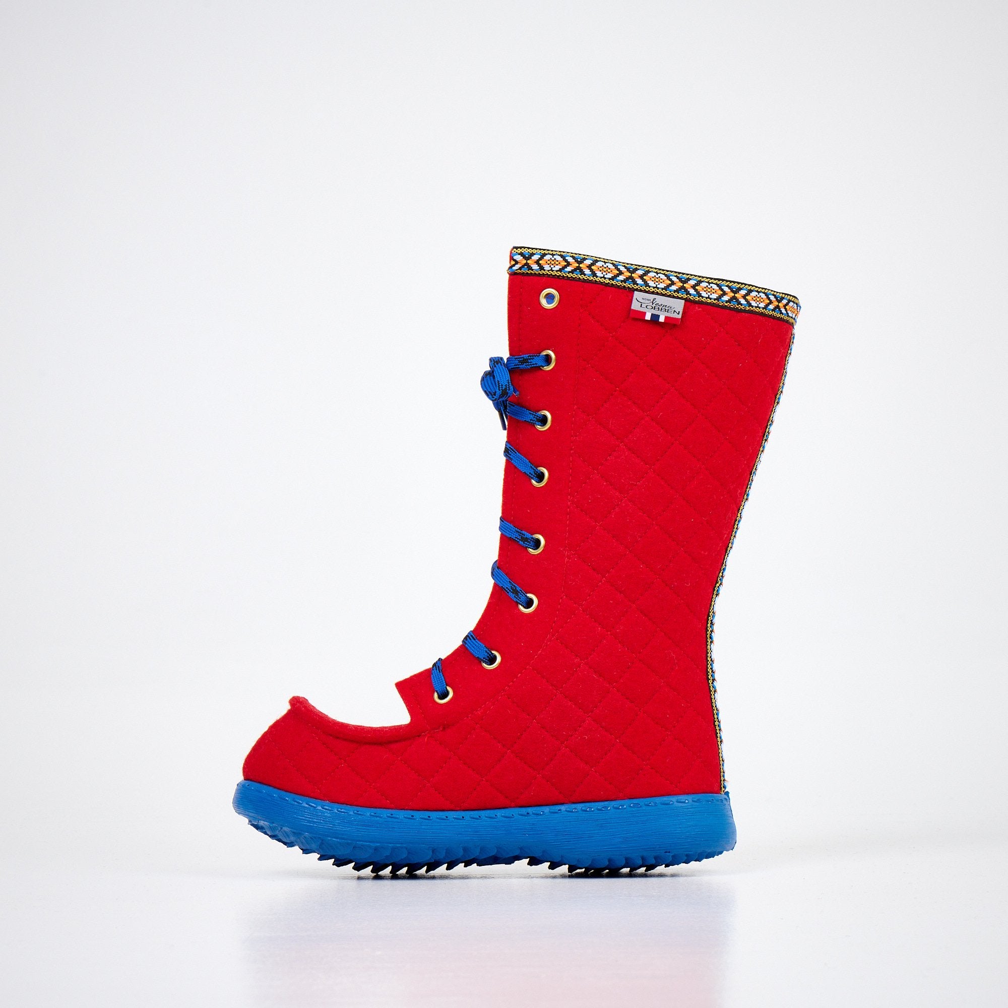 4. Side profile of Nesna Lobben Polar Lobben Felt Boots in red with blue soles, featuring intricate trim detail